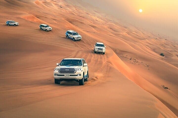Dubai Desert Safari with BBQ Dinner and Belly Dance — Evening Dune Bashing in Lahbab