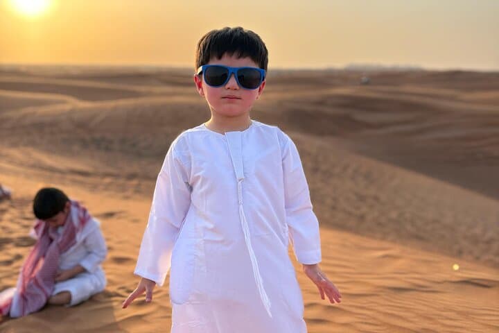 Evening Desert Safari Dubai: Dune Bashing, Camel Ride & BBQ Under the Stars