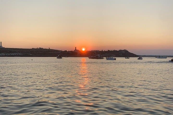 Sunset Boat Tour from Avola: Capopassero & Vendicari Snorkel with Aperitif photo 2