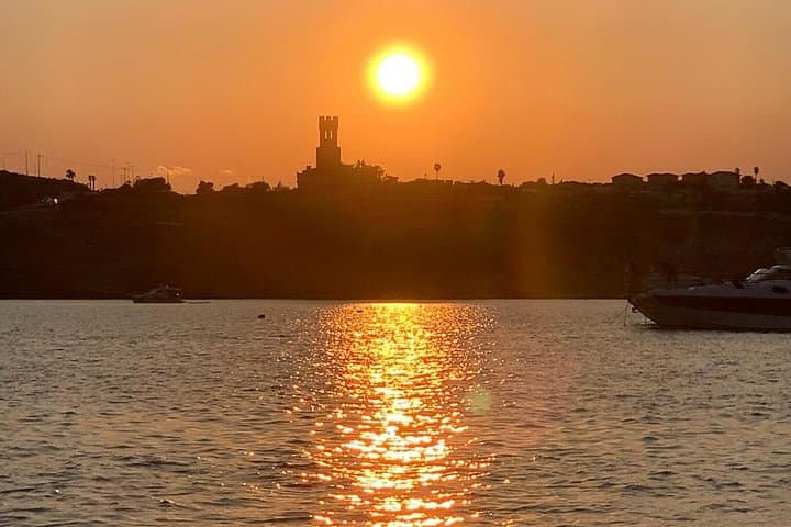 Sunset Boat Tour from Avola: Capopassero & Vendicari Snorkel with Aperitif photo 1