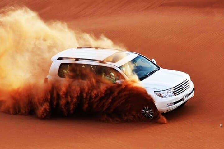 Evening Desert Safari Dubai: Red Dunes, Dune Bashing & Bedouin Camp Experience