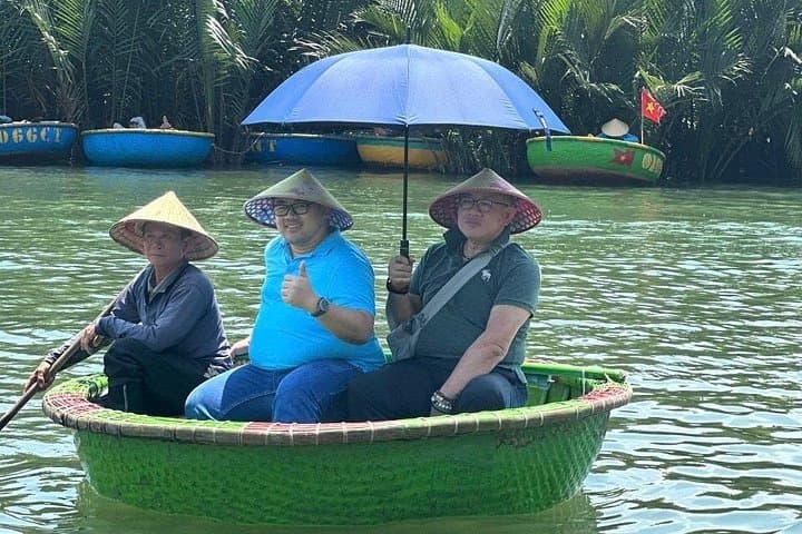 Hoi An Riverboat & Basket Boat Experience: Fishing, Lantern Making and Ancient Town Walk photo 1