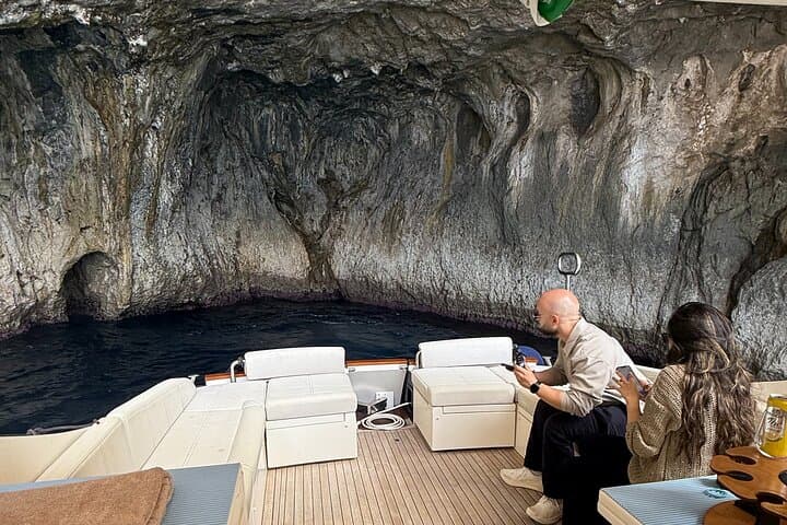 Capri Private Half-Day Boat Tour: Faraglioni, Grottos & Swim Stops photo 3