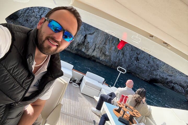 Capri Private Half-Day Boat Tour: Faraglioni, Grottos & Swim Stops photo 2