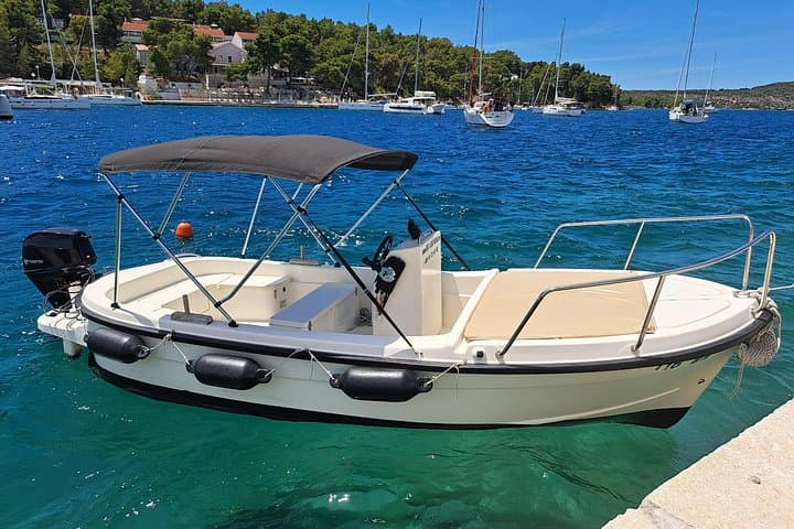 West Coast Brac Boat Tour: Hidden Bays, Snorkeling & Seaside Villages photo 1