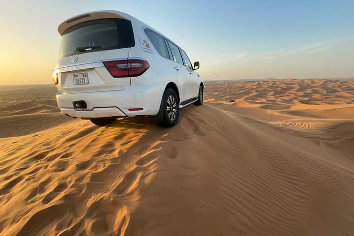 Sunset Red Dunes Desert Safari with BBQ, Live Shows & Dune Bashing in Dubai