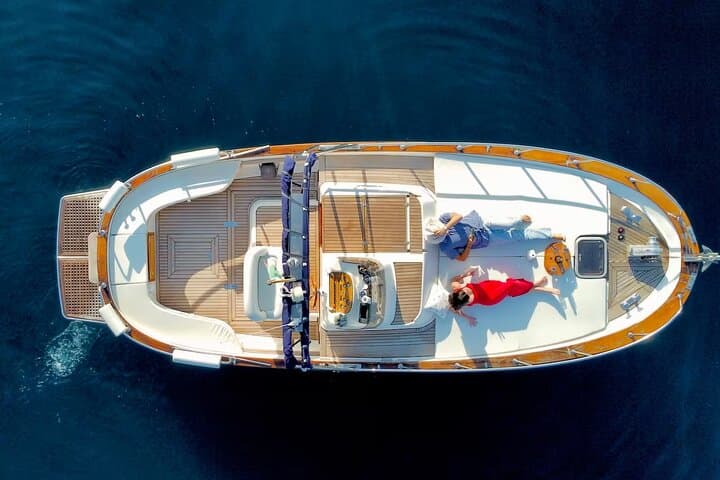 Private Capri Boat Tour: Circumnavigate Faraglioni & Grottos from Sorrento photo 2