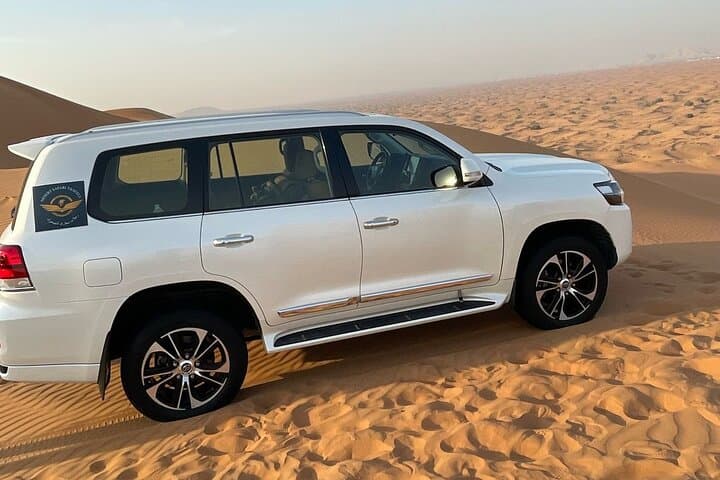VIP Evening Desert Safari in Lahbab: Dune Bashing, Sandboarding & BBQ Under the Stars photo 2