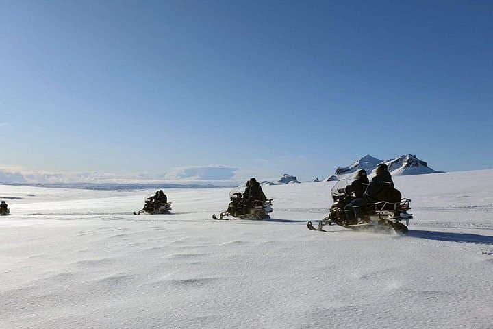 Run the Golden Circle and Race a Glacier: Langjokull Snowmobile Day Tour