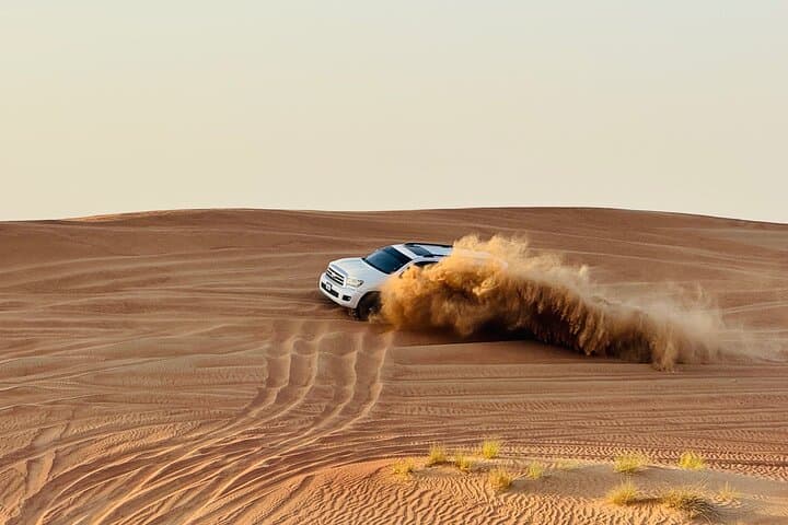 Private Dubai Desert Safari: Dune Bashing, Camel Ride & Traditional Camp Evening photo 4