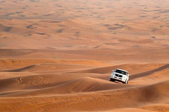 Evening Desert Safari in Lahbab: Sandboarding, Dune Bashing & BBQ Dinner from Dubai photo 5