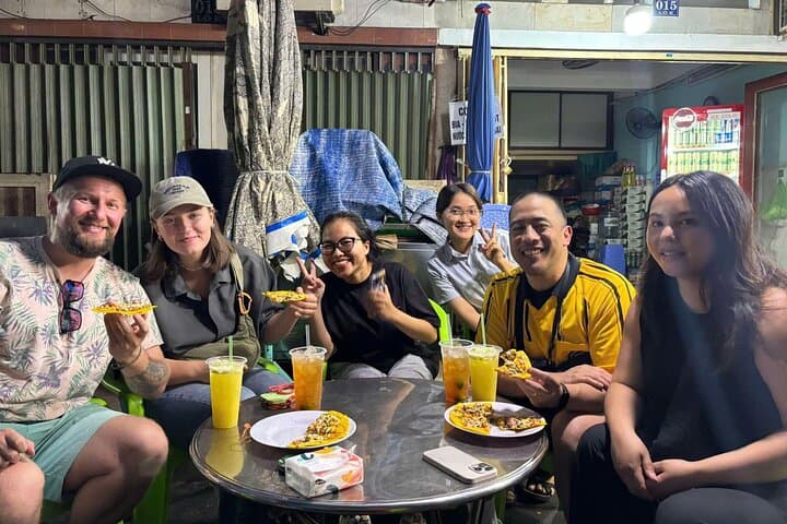 Saigon Night Street Food Tour by Scooter: Authentic Eats in 4 Hours photo 6