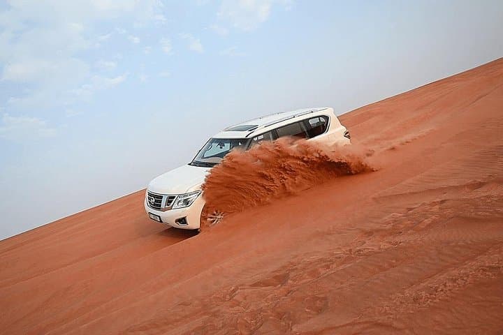 Dubai Red Dunes Desert Safari: Dune-Bashing, Sandboarding & Bedouin Camp Experience photo 2