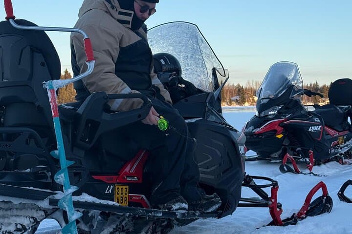 Lapland Snowmobile Safari with Ice Fishing and Northern Lights Hunt photo 5