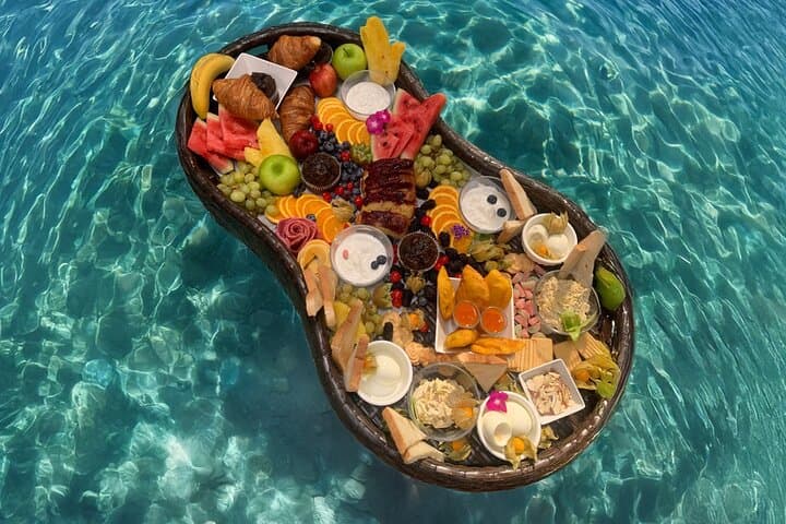 Private Aruba Morning: Swim with Turtles, Cave Pool Cliff Jump & Floating Breakfast photo 2