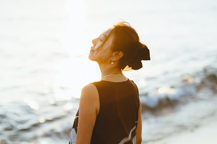 Sunrise Photoshoot on Kamari Black Sand Beach — Santorini Black Sand Portrait Session