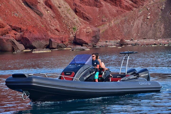 Private Santorini Caldera Boat Tour from Vlychada: Red Beach, Hot Springs & Secluded Coves photo 5