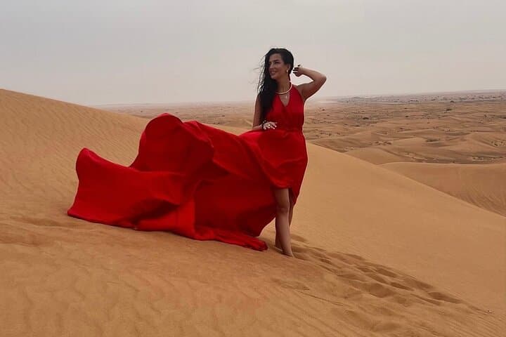 Evening Dubai Desert Safari: Dune Bashing, Sandboarding & Free Flying Dress Photos photo 1