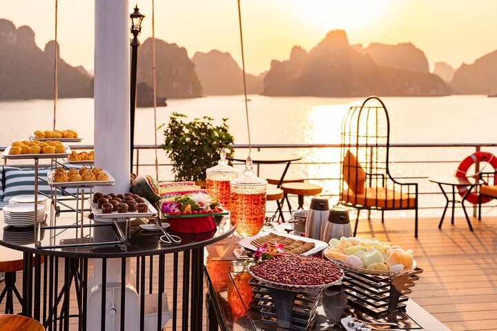 Luxury Day Cruise from Hanoi: Halong Bay Caves, Islands & Swim photo 2