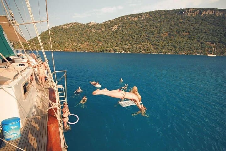 Blue Laguna Dolphin Cruise and Manavgat River Trip from Side — Swim, Foam Party & Lunch photo 4