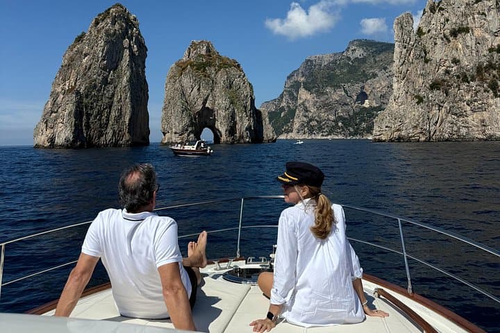 Capri Private Boat Tour: Blue Grotto, Faraglioni & Coastal Swimming from Positano photo 1