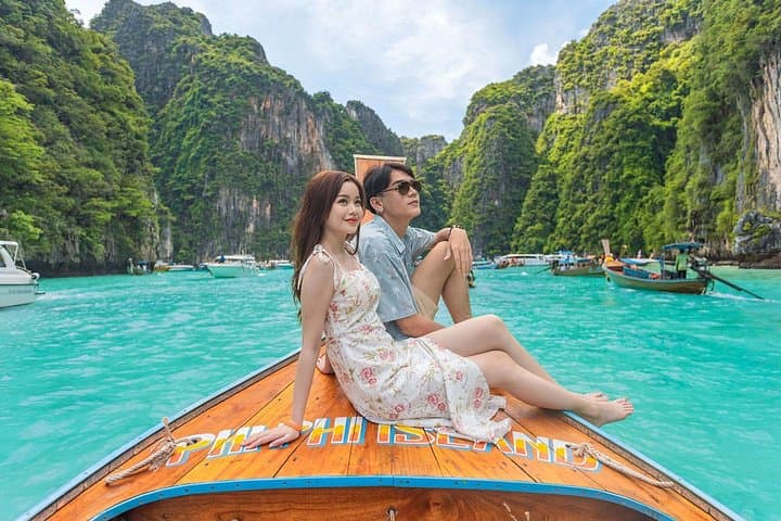 Phi Phi Sunset Longtail Cruise to Maya Bay and Snorkeling — Pi Leh Lagoon & Bioluminescent Swim photo 1