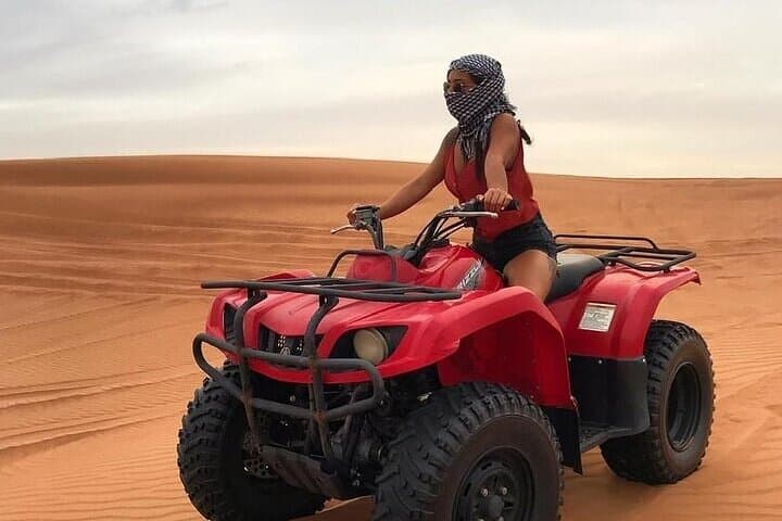 Dubai Red Dunes Safari: Quad Bike, Dune Bashing, Camel Ride & BBQ Under the Stars photo 2