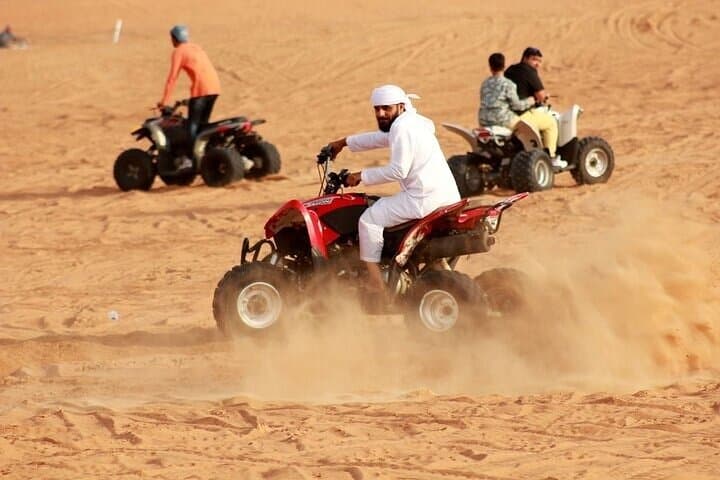 Dubai Red Dunes Safari: Quad Bike, Dune Bashing, Camel Ride & BBQ Under the Stars photo 3