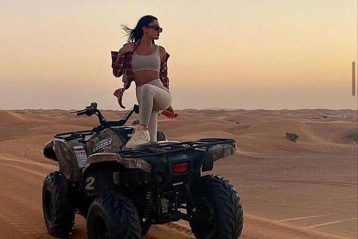 Dubai Red Dunes Safari: Quad Bike, Dune Bashing, Camel Ride & BBQ Under the Stars photo 4