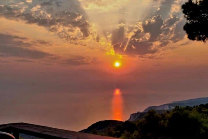 Zakynthos Sunset: Keri, Cameo & Damianos Cave Coastal Tour
