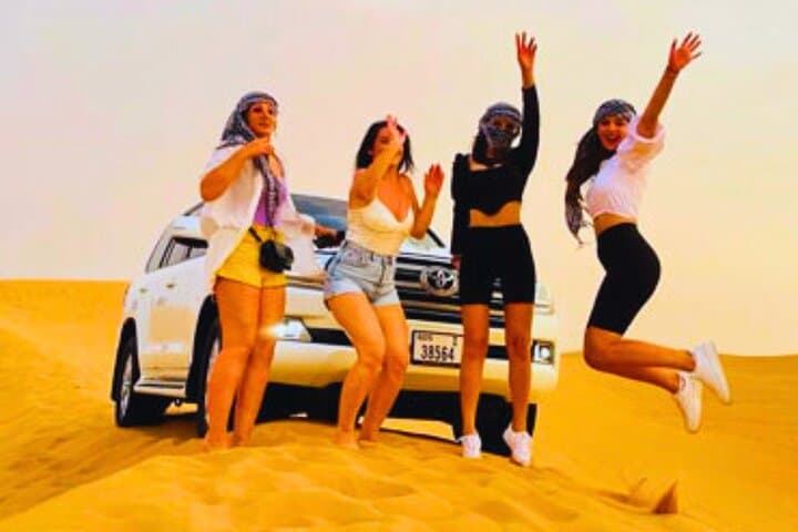 Sunset Desert Safari Dubai: Dune Bashing, Camel Rides & Bedouin Dinner Experience photo 3