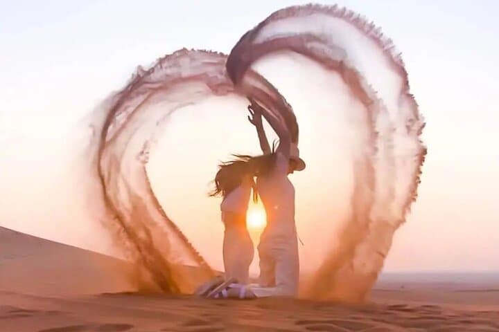 Sunset Desert Safari Dubai: Dune Bashing, Camel Rides & Bedouin Dinner Experience photo 4