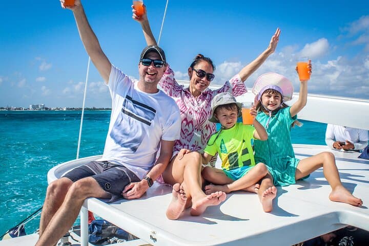 Isla Mujeres Catamaran Snorkel Tour with Free Transport and Open Bar
