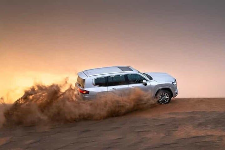 Doha Desert Safari: Quad Biking, Camel Ride & Sandboarding in Mesaieed