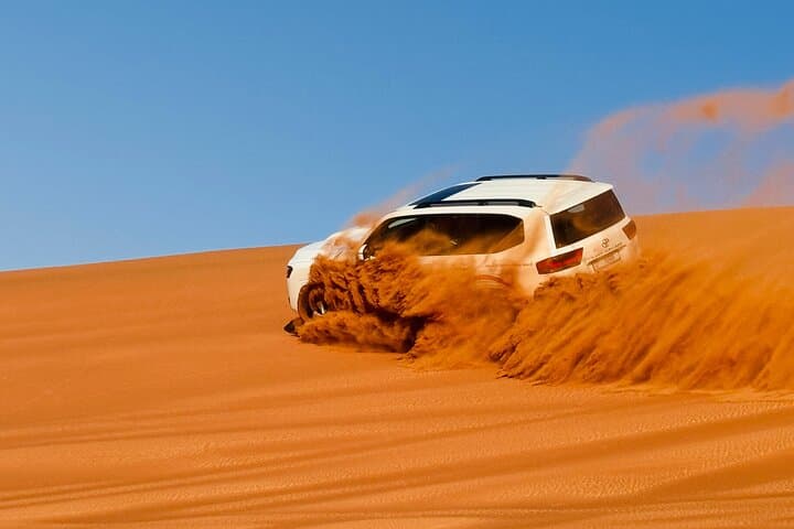 Dubai Desert Safari: Dune Bashing, Quad Bikes & Live BBQ Shows