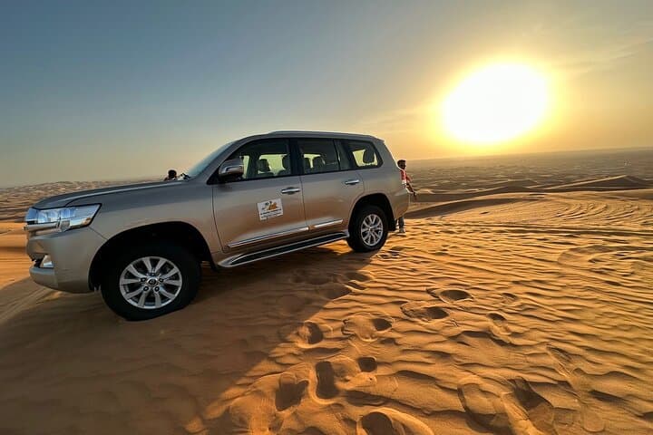 Luxury Dubai Desert Safari with BBQ, Dune Bashing & Live Shows photo 3