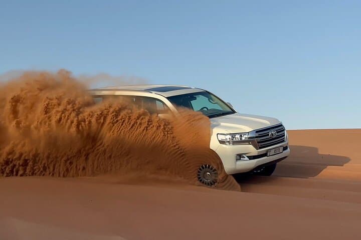 Luxury Dubai Desert Safari with BBQ, Dune Bashing & Live Shows photo 5