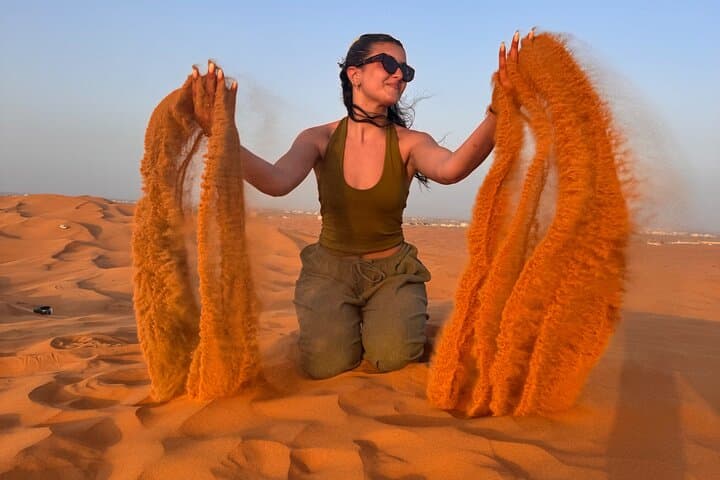 Luxury Dubai Desert Safari with BBQ, Dune Bashing & Live Shows photo 6