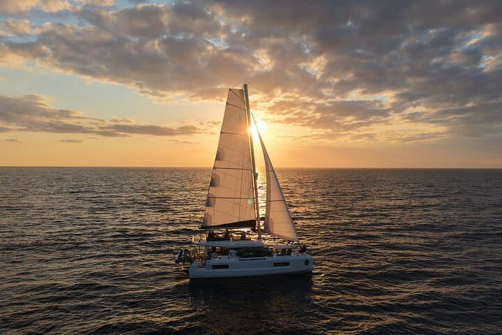 Sunset Catamaran to Agriates: Swim L'Acciolu & Gourmet Aperitif from L'Île-Rousse photo 1