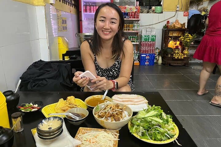 Explore Da Nang's Han River and Culinary Scene with a Cruise and Street Food Adventure photo 3