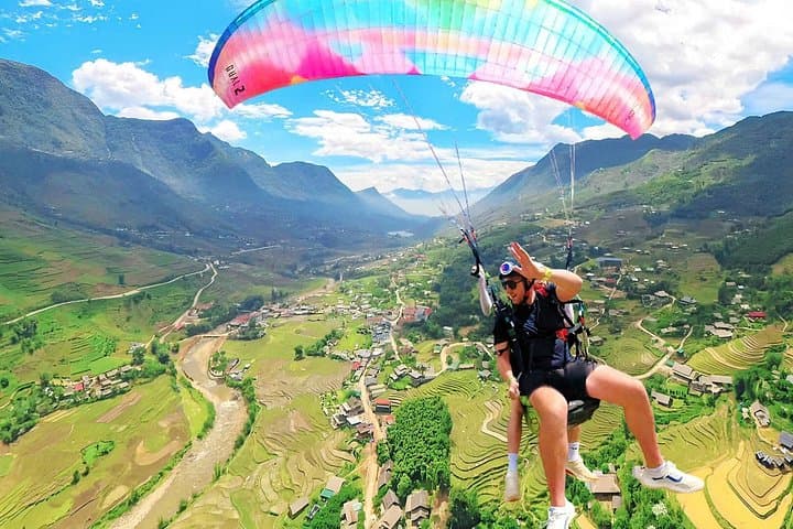 Soar Over Sapa: Fansipan Tandem Paragliding Above Rice Terraces photo 2
