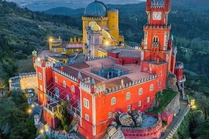 Full-Day Sintra: Pena Palace, Regaleira Pass-By & Cascais Small-Group Tour from Lisbon