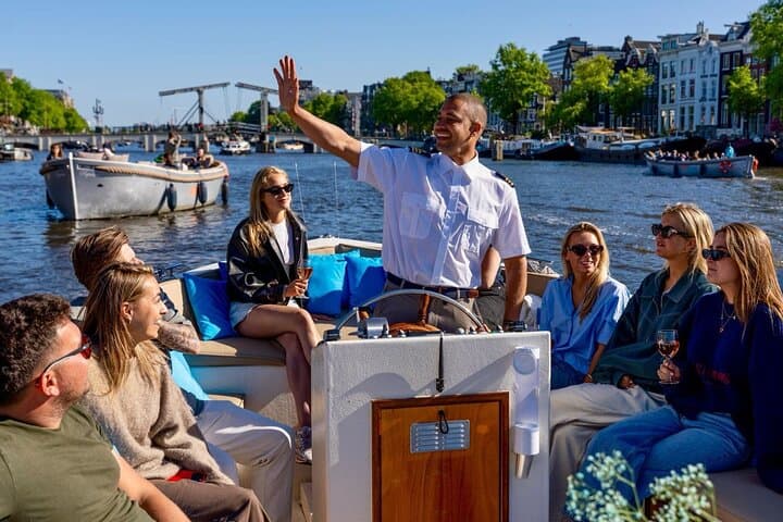 Open-Boat Amsterdam Canal Cruise: 60-Min Guided Tour with Optional Unlimited Drinks photo 3