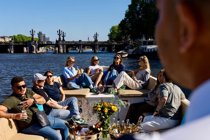 Open-Boat Amsterdam Canal Cruise: 60-Min Guided Tour with Optional Unlimited Drinks