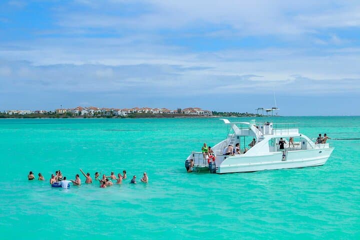 Cap Cana Luxury Catamaran Cruise: Snorkel, Juanillo Beach Club & Cenote Swim photo 3