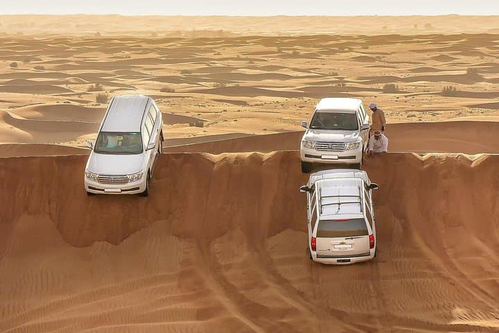 Dubai Evening Desert Safari: Dune Bashing, Camel Rides & BBQ Under the Stars photo 1