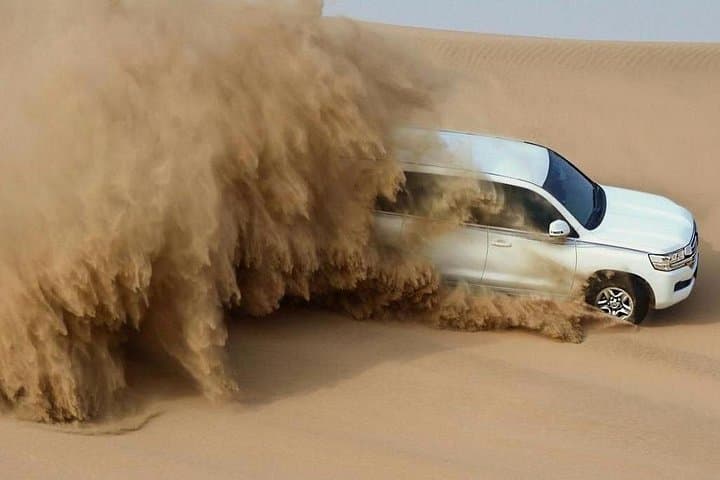 Doha Desert Safari to the Inland Sea: Dune Bashing, Camel Ride & Sandboarding photo 1