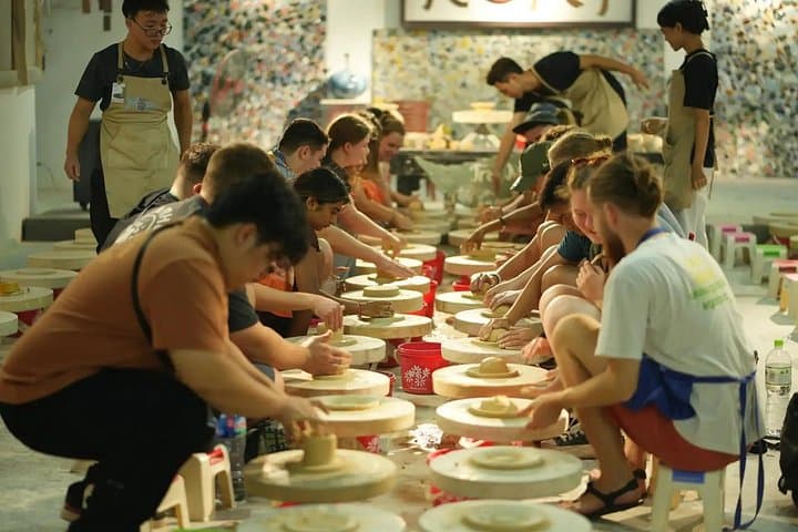 Hanoi Vespa Tour to Bat Trang Ceramic Village: Long Bien Bridge & Pottery Class photo 4