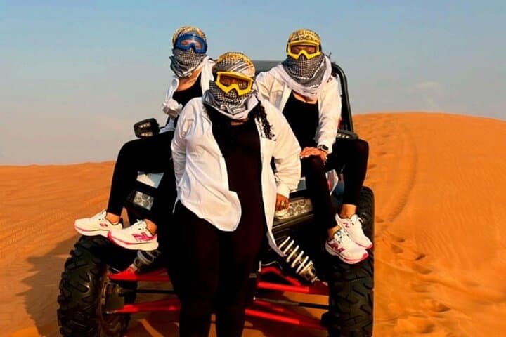 Dubai Red Dune Quad Bike Adventure with BBQ Dinner & Live Show photo 4