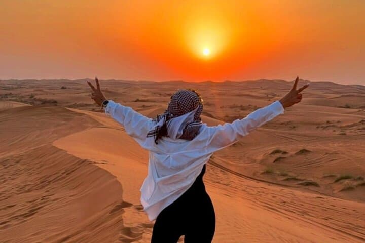 Dubai Red Dune Quad Bike Adventure with BBQ Dinner & Live Show photo 5